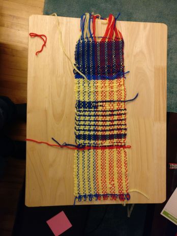Sampler made on a toy loom