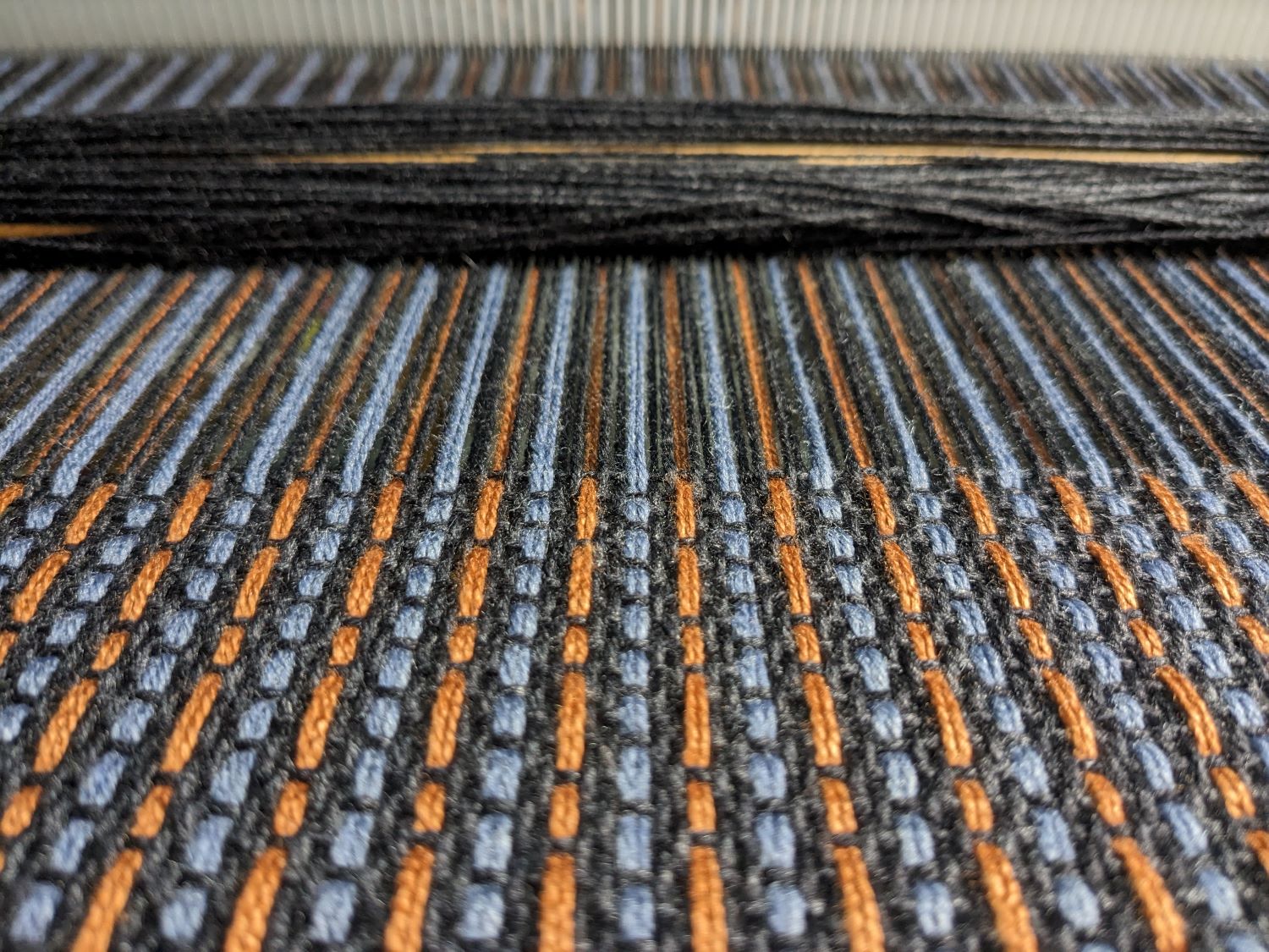 A photo of the design on the loom